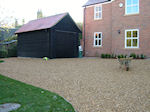 Shingle Driveway with garden planting and drainage